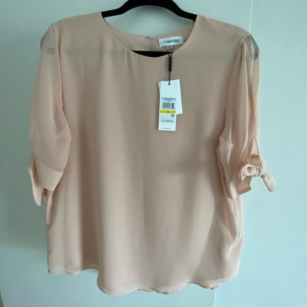 Calvin Klein women peach top
